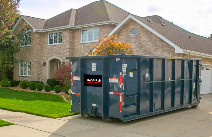 photo of rented dumpster at a hgouse in South Lyon